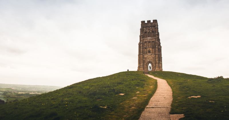 A stone tower on a hill top