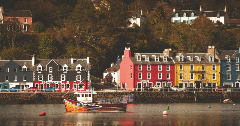 A row of colourful buildings on the water front