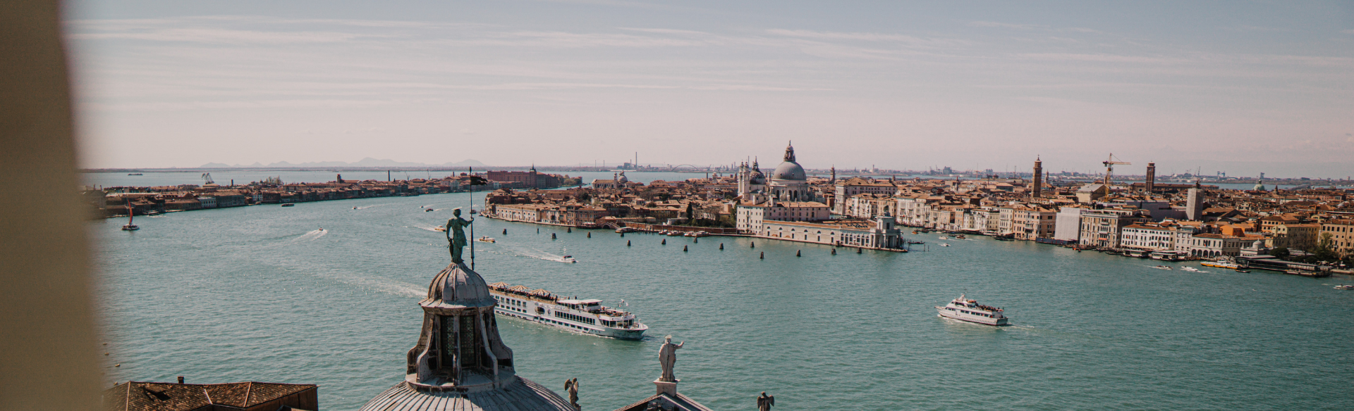 view over venice with boats in the canal