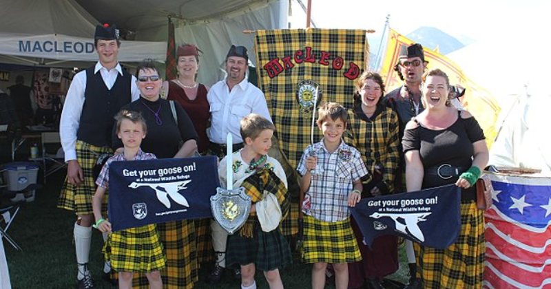 Different aged members of the Scottish Clan MacLeod celebrate their heritage together