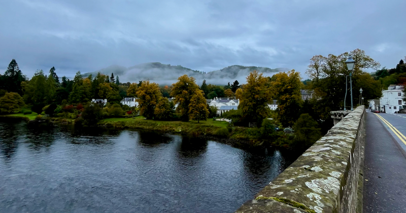 A bridge over water on a cloudy day