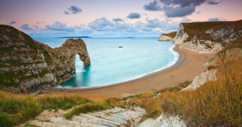 Striking rock formation in the ocean by a beach