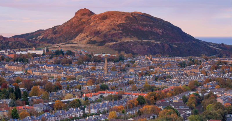 A big hill overlooking a city