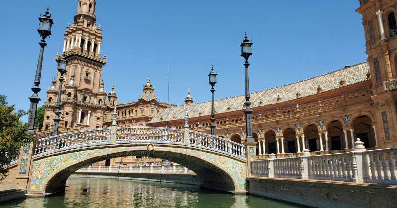 A bridge over a river in a Spanish courtyard